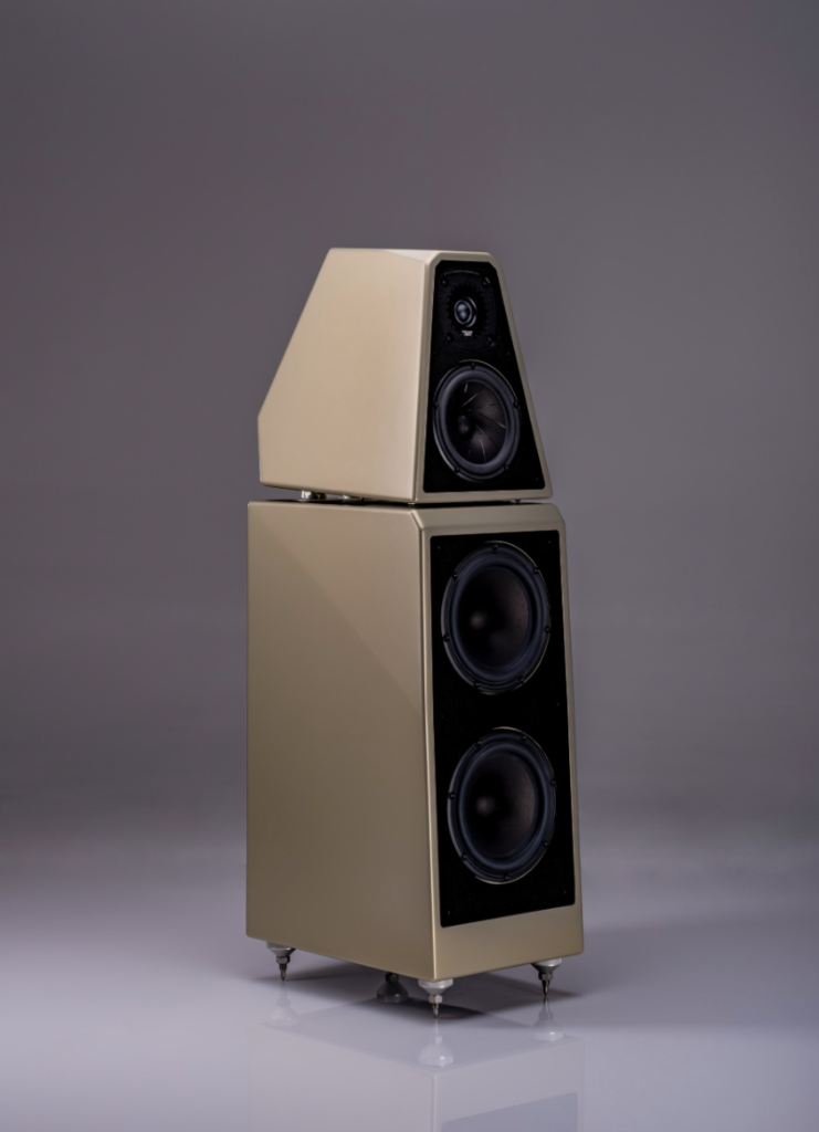 Wilson Audio WATT Puppy In Cream Finish, placed with a gradient background